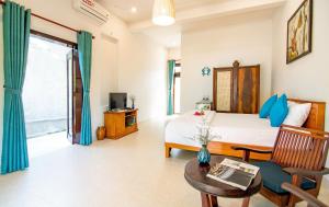 Μια τηλεόραση ή/και κέντρο ψυχαγωγίας στο An Bang Vu Nhi Homestay