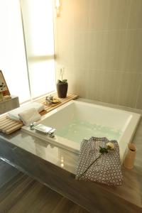 Vannituba majutusasutuses Hotel Day Plus Teascape