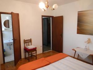 Posteľ alebo postele v izbe v ubytovaní Dinka's Apartment