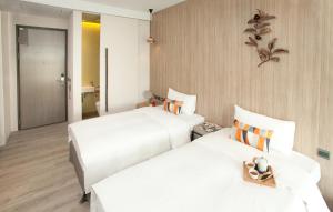 Voodi või voodid majutusasutuse Hotel Day Plus Teascape toas