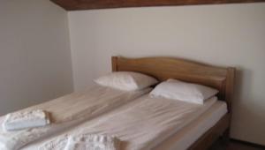 Кровать или кровати в номере Pensiunea Casa Szabi
