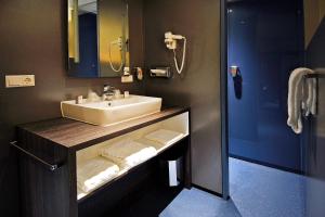 Koupelna v ubytování City Hotel Gouda, WorldHotels Crafted Collection