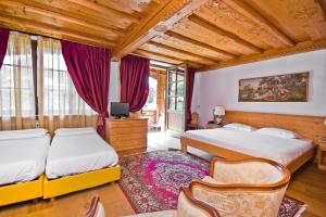 Posteľ alebo postele v izbe v ubytovaní Hotel Edelhof