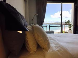 Una cama o camas en una habitación de il Piccolo Polpo Hotel