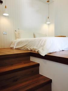 Una cama o camas en una habitación de il Piccolo Polpo Hotel