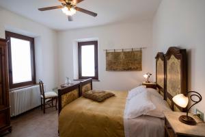 Postel nebo postele na pokoji v ubytování I Rondoni B&B