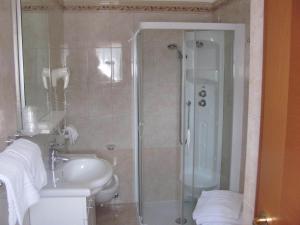 Koupelna v ubytování Hotel Franco