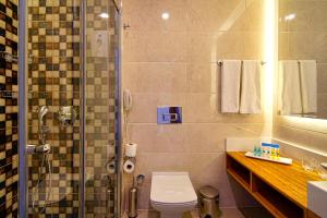 Koupelna v ubytování Dosinia Luxury Resort-Ultra All Inclusive