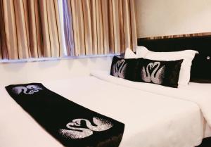 Katil atau katil-katil dalam bilik di Seasons Hotel - Causeway Bay