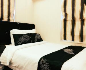 Katil atau katil-katil dalam bilik di Seasons Hotel - Causeway Bay