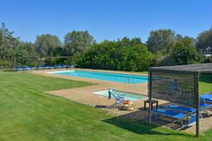 Bazén v ubytování Apartment I Fontanili nebo v jeho okolí