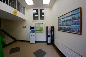 a building with a vending machine in a hallway at 54a Tselinogradskaia Str at Alekseevka underground in Kharkiv