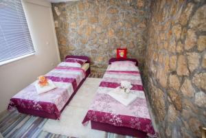 Postel nebo postele na pokoji v ubytování Apartment Any