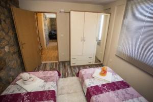 Postel nebo postele na pokoji v ubytování Apartment Any