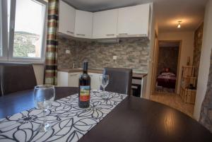 Kuchyň nebo kuchyňský kout v ubytování Apartment Any