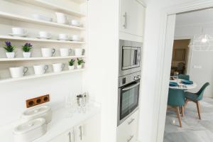 Kuchnia lub aneks kuchenny w obiekcie GR Suites Boutique Picasso