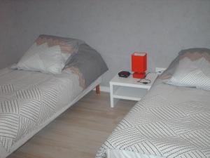 Postel nebo postele na pokoji v ubytování Meublé de tourisme*** letrilogis