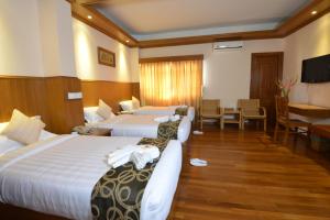 Katil atau katil-katil dalam bilik di Hotel Sidney