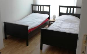 Postel nebo postele na pokoji v ubytování 95m²-Apartment Tunnel