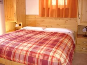 Posteľ alebo postele v izbe v ubytovaní Chalet Alberti