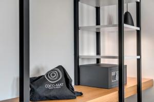 Voodi või voodid majutusasutuse Naves Suites toas
