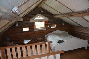 Postel nebo postele na pokoji v ubytování Kolarbo Gård B&B