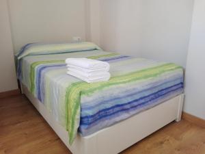 Posteľ alebo postele v izbe v ubytovaní Apartamento Pura Vida