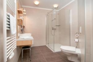 Bagno di Erlebnis-Hotel-Appartements