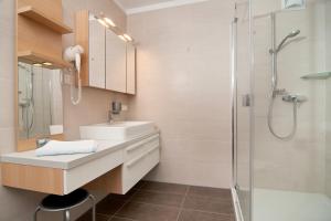 Bagno di Erlebnis-Hotel-Appartements