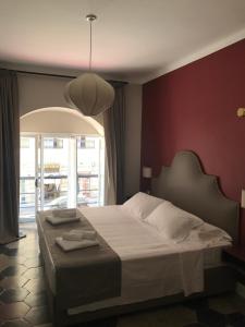 Ein Bett oder Betten in einem Zimmer der Unterkunft Residenza Roma Imperiale
