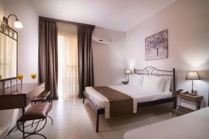 Postel nebo postele na pokoji v ubytování Hotel Rema