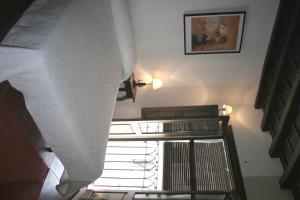 Łóżko lub łóżka w pokoju w obiekcie Apartamentos Rurales Víctor Chamorro del Arco