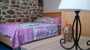 Postel nebo postele na pokoji v ubytování Holiday House Popovic
