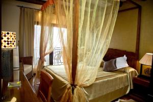 Postel nebo postele na pokoji v ubytování Hotel & Spa Sierra de Cazorla 4*