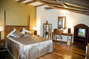 Postel nebo postele na pokoji v ubytování Hotel & Spa Sierra de Cazorla 4*