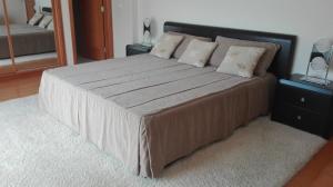 Ένα ή περισσότερα κρεβάτια σε δωμάτιο στο Quarto/Suite de Charme