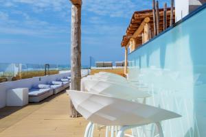 Ein Balkon oder eine Terrasse in der Unterkunft HM Tropical