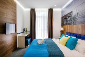 Postel nebo postele na pokoji v ubytování Hotel Solero + 37 fotografií