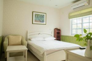 Postel nebo postele na pokoji v ubytování Mallorca Homestay
