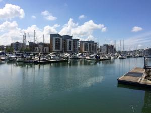 a marina with lots of boats in the water at The Nook @ Drop Anchor in Portishead