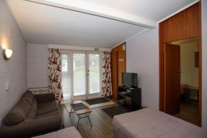 Posezení v ubytování Kauri Lodge Motel