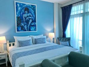 Кровать или кровати в номере Casa Blanca Boutique Hotel - SHA Plus