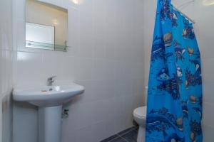 Een badkamer bij Guest House Triumph