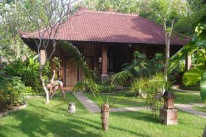 Zahrada ubytování Tirta Sari Bungalow