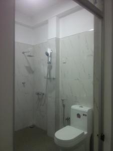 A bathroom at Shady mango villa