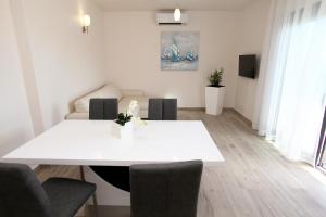 Galería fotográfica de Apartments Villa Aquamarie en Trogir