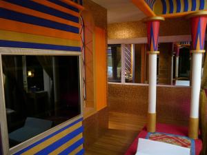 Rúm í herbergi á Sexy City Motel
