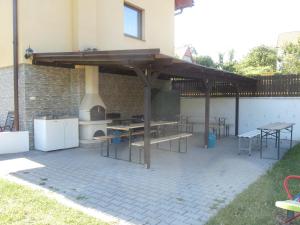 Patio alebo iná vonkajšia časť ubytovania Vila Jaro