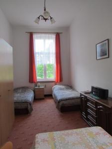 Postel nebo postele na pokoji v ubytování Villa Freya