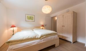 Ein Bett oder Betten in einem Zimmer der Unterkunft Haus Kissel